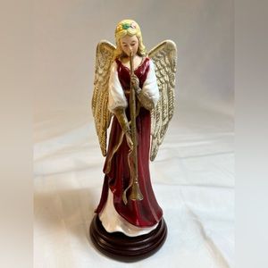 Vintage Angel figurine holding musical instrument. Resin. 6.5” H x 2.5”W